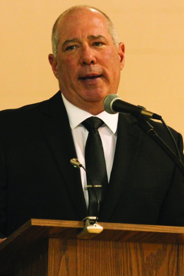 CEO Neil J. Pollack presides over a graduation ceremony at the Anderson Center for Autism in Dutchess County.