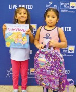   Students from New Milford sport items from UWWC”™s back-to-school program. 