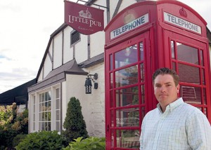 Lars Anderson, operations manager of the Little Pub stands in front of the Branchville location on Route 7