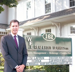 Bill Leopold, the principal of WFL Real Estate Services, in front of his office on East Avenue in Norwalk.