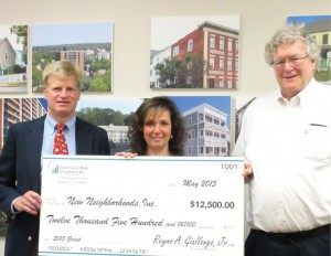 From left: Gene Schreiner, First County Bank; Anne Marie Pace, First County Bank; and Ross Burkhardt, New Neighborhoods Inc.