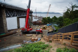 This photo shows the construction zone in Tarrytown where a pier will be built to facilitate the landing of the new Tappan Zee Bridge. The Metro-North Hudson Line train tracks can be seen going under the existing bridge. Workers will have to work over the railway, disrupting train service on three separate Friday nights.