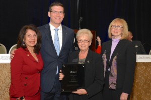 Maryann Tercasio, second from right, with her 2015 Realtor of the Year award. From left are Carol Christiansen, 2014 Realtor of the Year; Drew Kessler, Hudson Gateway Association of Realtors president; Tercasio; and Sharlene Forman, HGAR Recognition Committee chairperson.