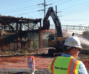 Tighe & Bond, the environmental consulting group for the town of Stratford, oversees the demolition of the Contract Plating site. Photo by Reece Alvarez 