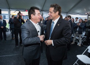 Dr. Leonard Schleifer, CEO of Regeneron Pharmaceuticals Inc., and Gov. Andrew Cuomo share a laugh at a Thursday ceremony marking the opening of Regeneron”™s two new buildings on the Landmark at Eastview campus in Mount Pleasant.     