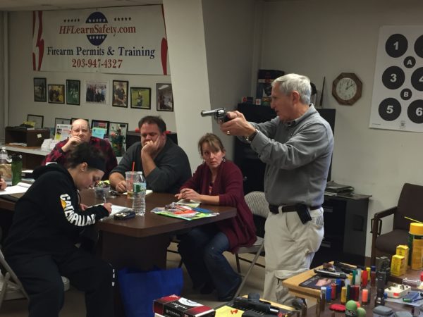 Herb Furhman teaches a gun permit class in New Milford. 