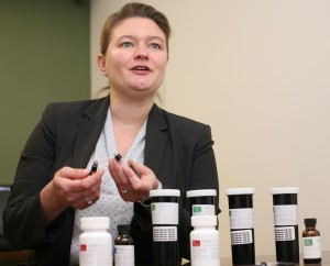 Dr. Laura Bultman displays a vaporizer used to inhale cannabis oil and other medical marijuana products at the new Vireo Health of New York medical marijuana dispensary in White Plains.