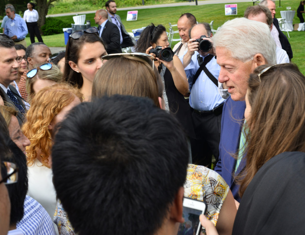 bill clinton Swiss Re ribbon cutting