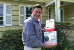 inventor shows fire safety alarm