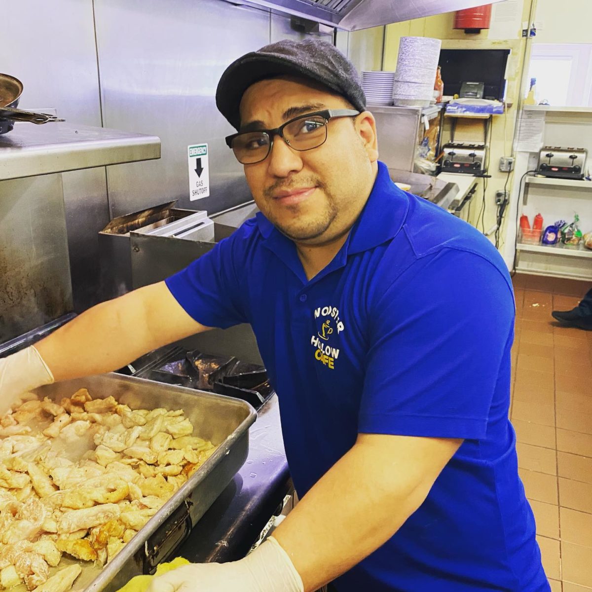 Chef cooking in the kitchen at Wooster Hollow Cafe