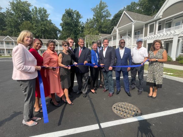 Westchester County Executive George Latimer, center, leads ribbon-cutting ceremony at Mayfair Apartments.