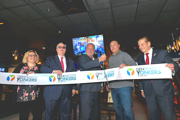 Mayor Spano cuts ribbon for Hook & Reel restaurant opening. Photo courtesy City of Yonkers.