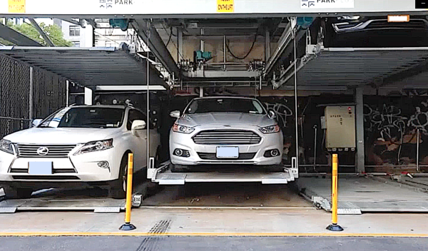 Automated parking system, similar to what's proposed for 47 Cannon St., Poughkeepsie, lifts car to second level.
