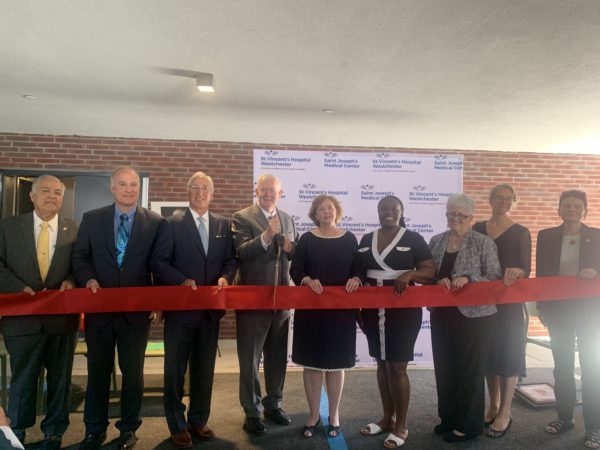 From left: Assemblyman Nader Sayegh; Ralph Fasano, CEO, Concern Housing; Michael Spicer, CEO, St. Joseph's Medical Center; Jim Landy; Lorraine Horgan, St. Joseph's Medical Center; Yonkers City Council President Lakisha Collins-Bellamy; Dr. Ann Sullivan, commissioner, Office of Mental Health; RuthAnne Visnauskas, commissioner, Homes and Community Renewal; Brenda McAteer, Office of Temporary and Disability Assistance.