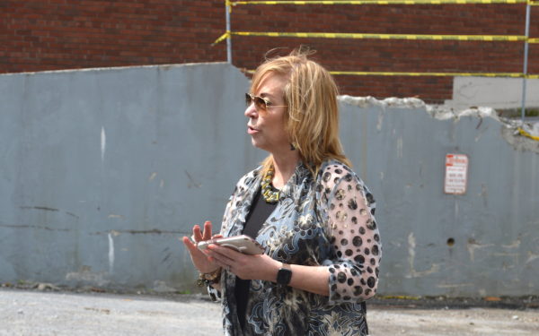 Cynthia Delfino speaks at groundbreaking event. Photo by Peter Katz.