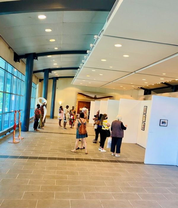 Attendees visiting the “City of Yonkers x Yonkers Gallery Pop-up Show,” a collaboratively curated exhibition featuring a wide-range of diverse artists who responded to the citywide call for entry. Photo by Roddy Wildeman, director at Warburton Galerie/US+U Gallery.