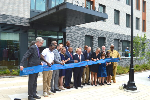 Ribbon-cutting at The Overture in White Plains. Mayor Tom Roach is at the left.