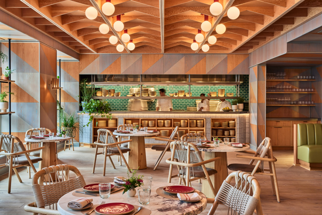 A second abcV bows in Jean-Georgesâ€™ Tin Building