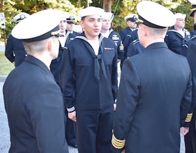 PEEKSKILL NATIVE RECEIVES  COMMAND COIN