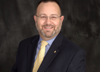 BANK HIRES DEVELOPMENT MANAGER