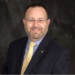 BANK HIRES DEVELOPMENT MANAGER