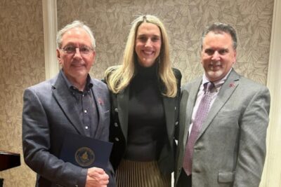 Rev. David Van Dyke, Stamford Mayor Caroline Simmons and Bob Arnold.