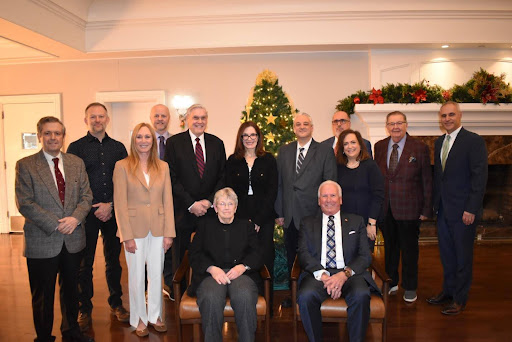 Seated: Mary K. Spengler, CEO of Hospice of Westchester, with Tree of Life sponsors and William F. Flooks Jr. Back row: Ray Planell, Jason Titus, Michele Fraser Geller, Richard Mitchell, Matt McCrosson, Stacey Ross Cohen, Anthony Ciarletta, Paul Fernandez, Donna Ruzzi, Chet Day and Matt Parisi.