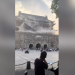 CNN WIRE — Tourists scramble as 600-year-old Chinese tower partially collapses: VIDEO