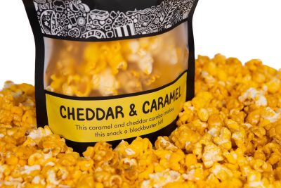 Classic Caramel Gourmet Popcorn in a resealable bag, each kernel coated in rich, buttery caramel, made in the USA by Prospector Popcorn.