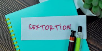 Sister sentenced in brother’s extortion scheme