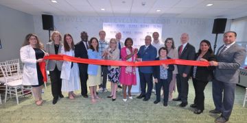 Burke cuts ribbon for scanner suite